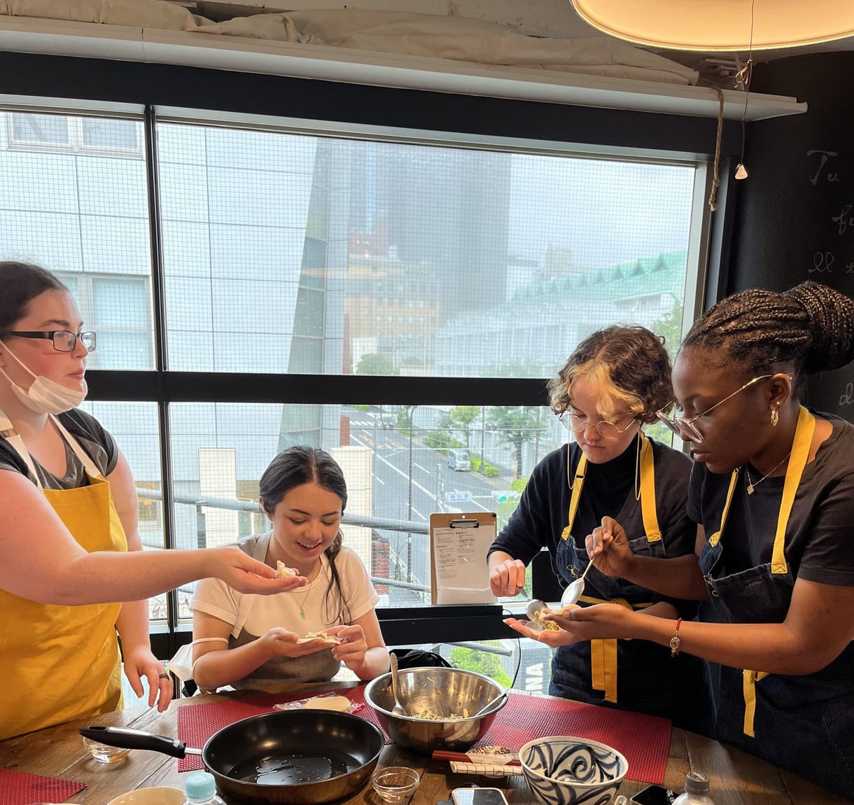 Cooking side by side with guests
